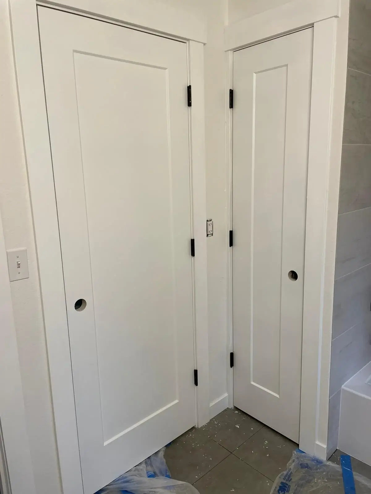 Image where you can see two doors recently installed by Leo's flooring